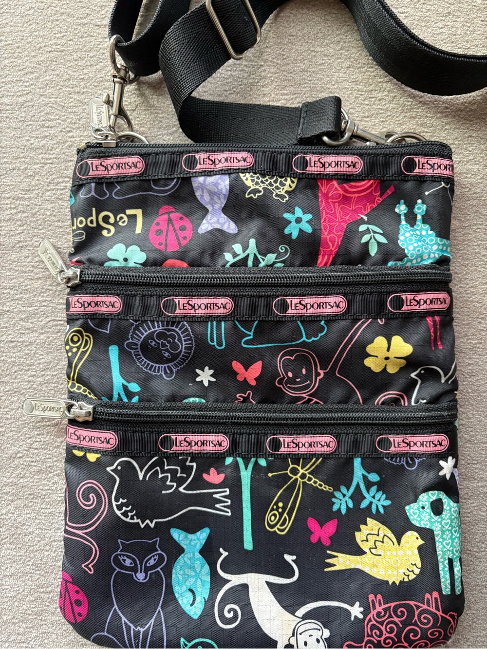 LeSportsac Black Crossbody with Colorful Animal & Floral Print